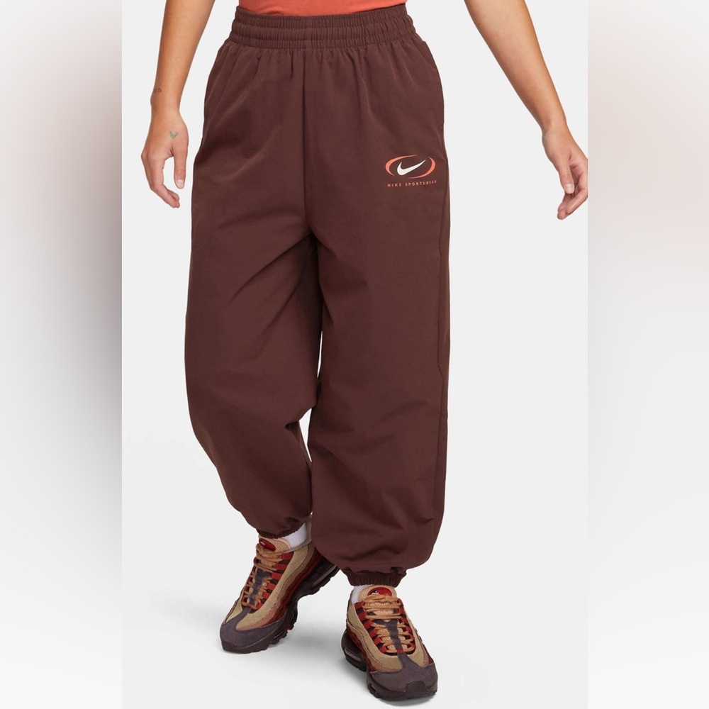 Nike Swoosh Woven Parachute Sweatpants in Earth Brown